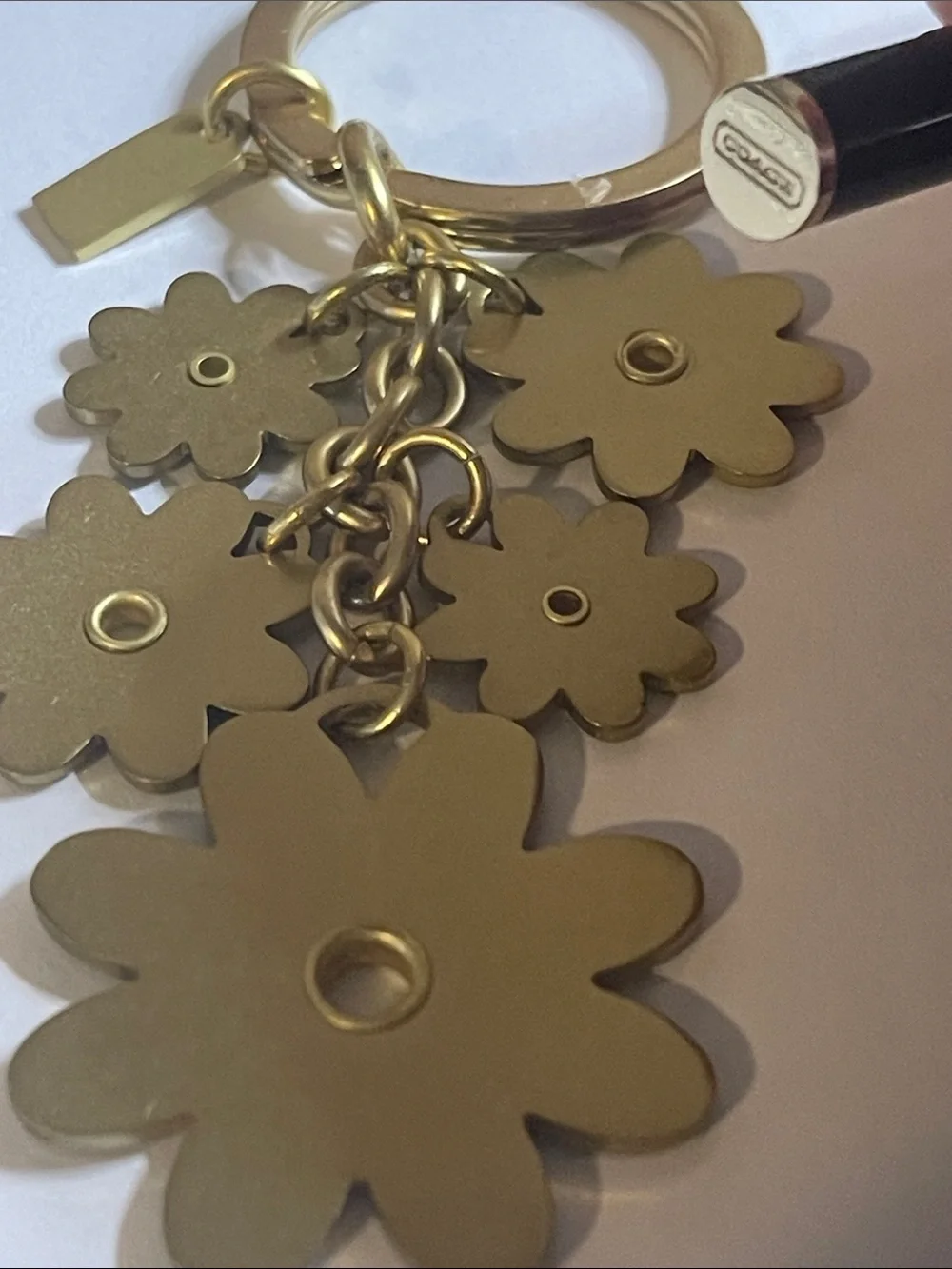 Coach Gold Daisy Cluster Keychain and Coach Pen